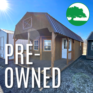 PRE-OWNED 12' x 32' Treated "Deluxe Lofted Cabin"