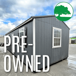PRE-OWNED 12' x 32' Painted "Side Utility / Cabin"